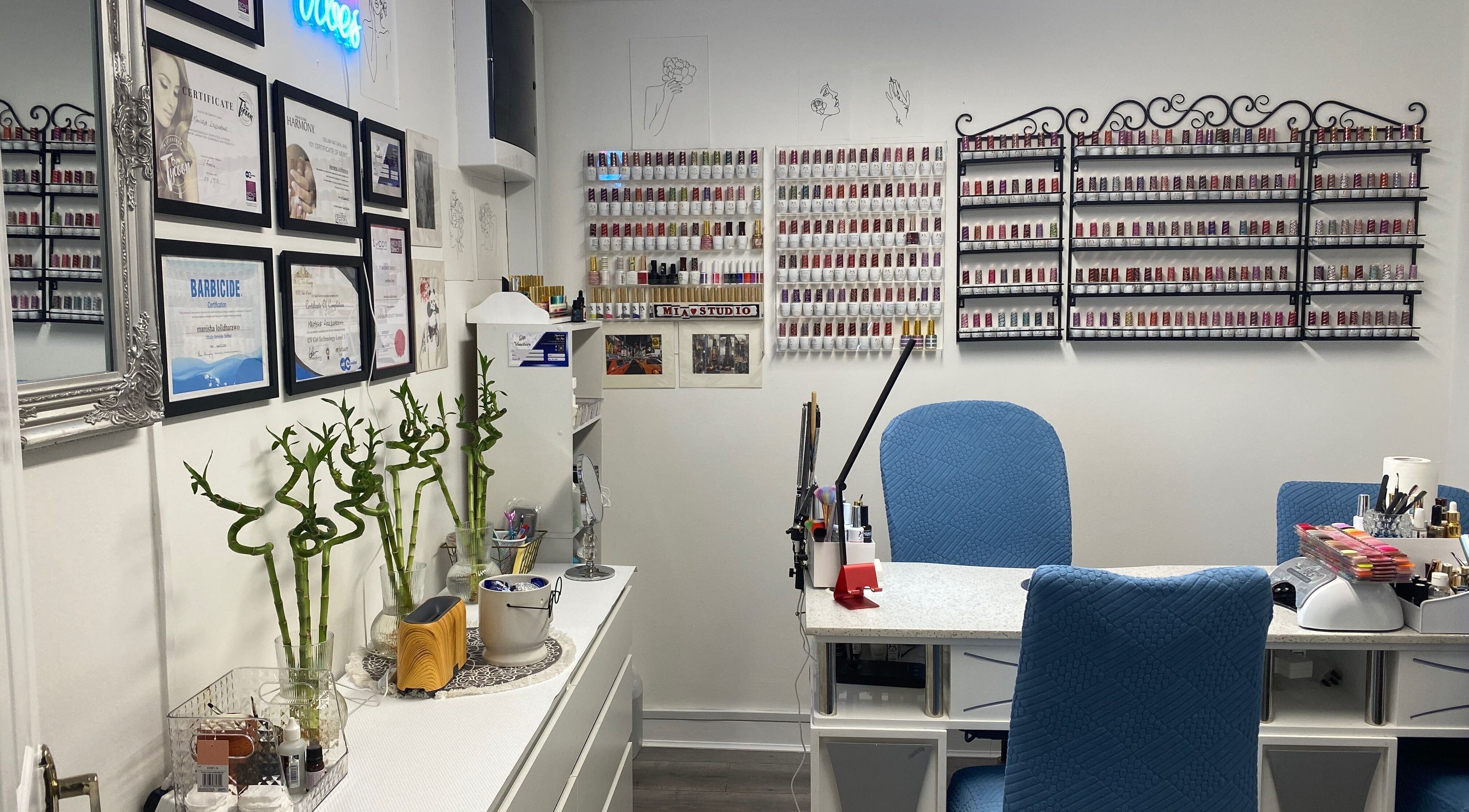 Inside Renuka & Mia’s Beauty & Nails Salon, Carrickmacross. Vibrant nail polish displays and chic decor.