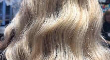 Blonde wavy hairstyle at Costyle Hairdresser Salon, Morley, Western Australia, AU.