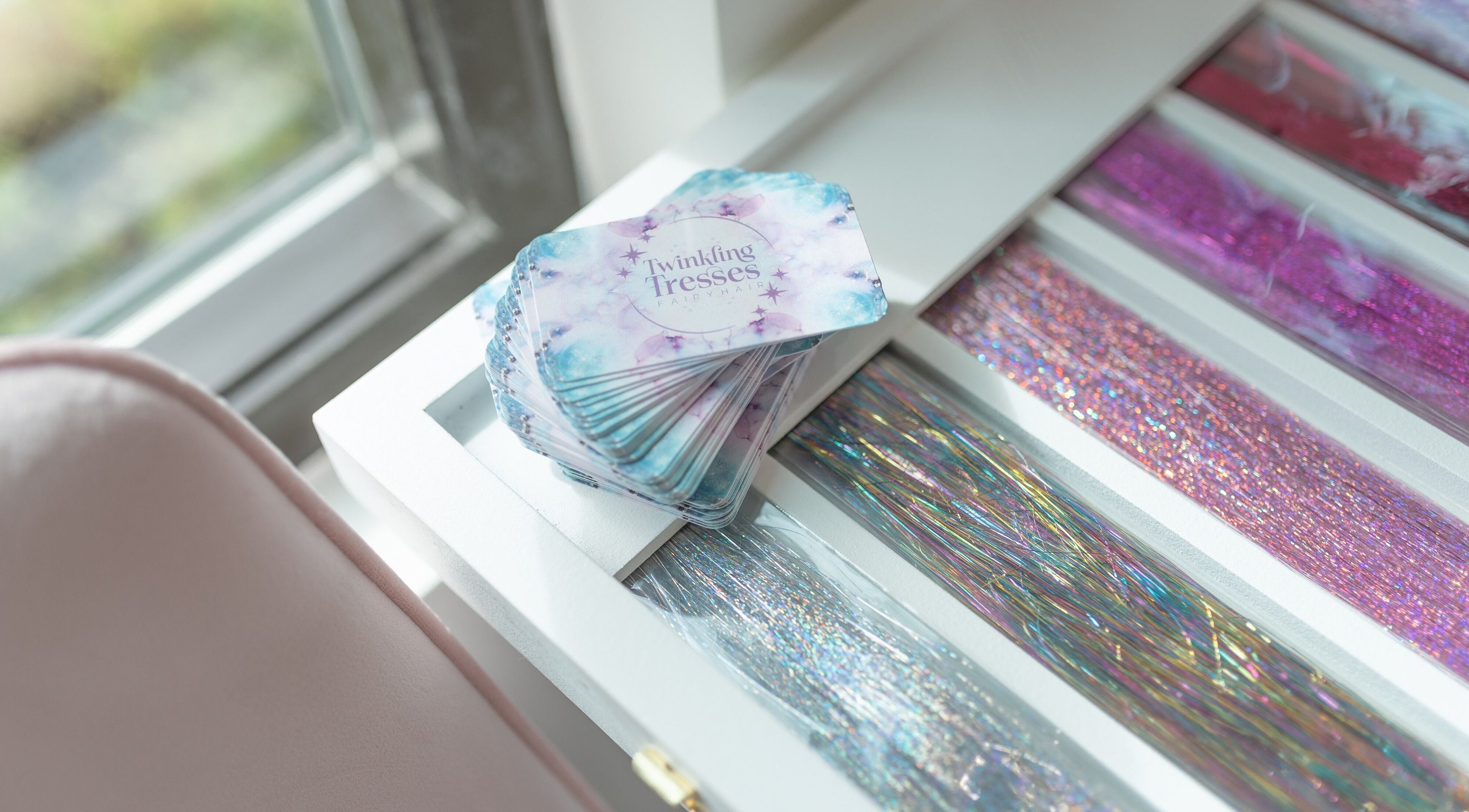 Twinkling Tresses display at Clermont - Florida (The Orange Blossom Belle), showcasing colorful, shimmering hair extensions.