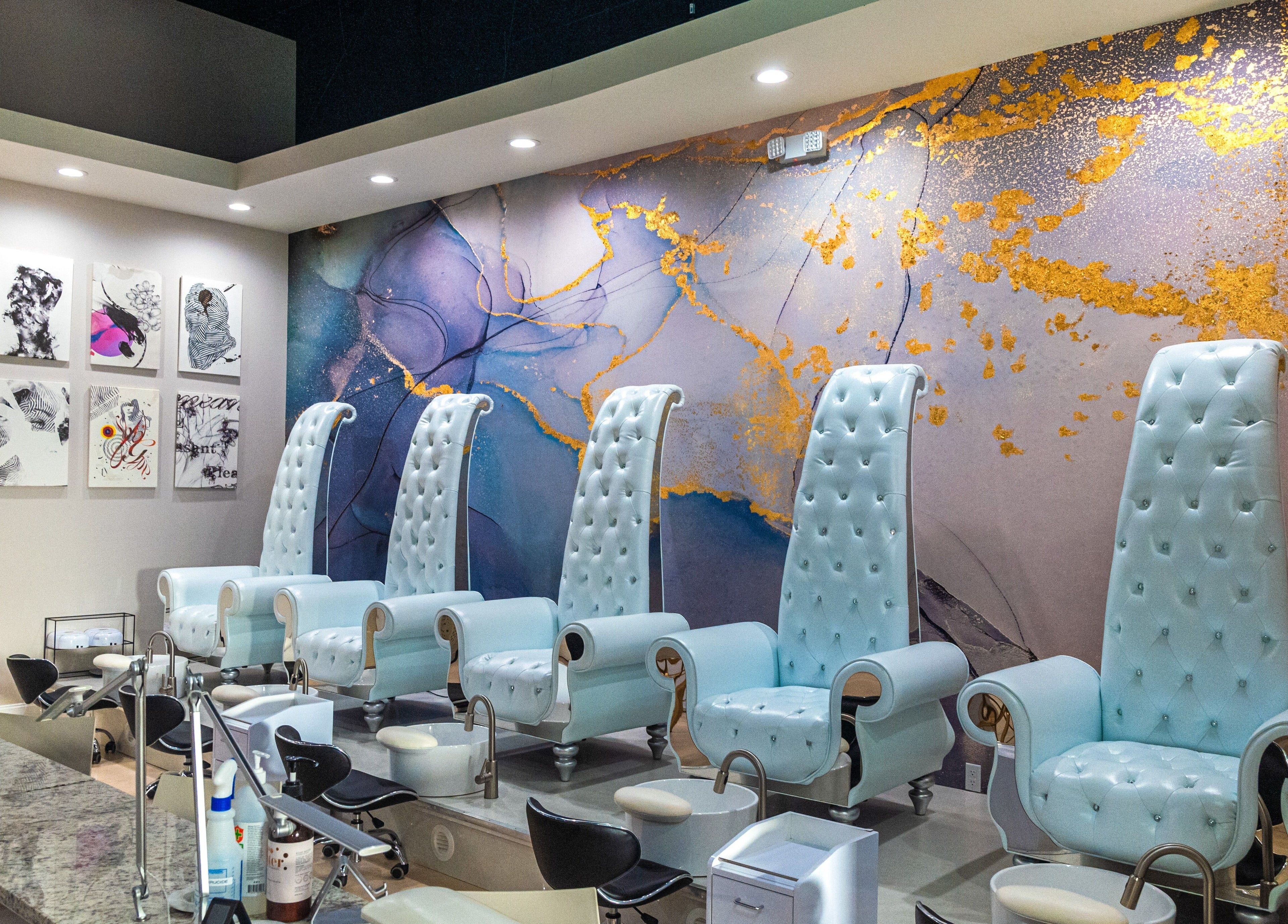 Elegant nail spa chairs at Gloss Nail Atelier, Sterling Heights, Michigan, US showcasing a chic, modern design.