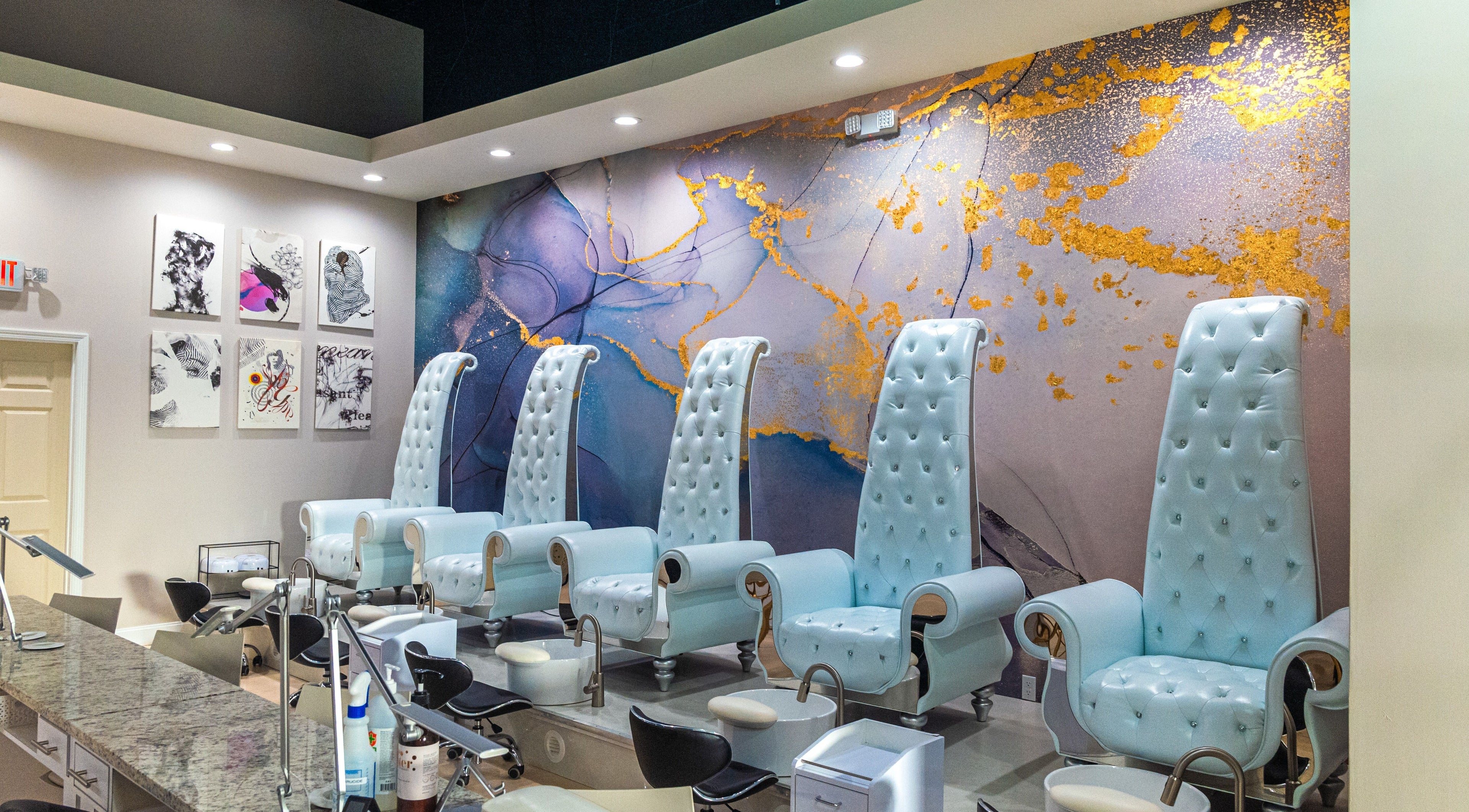 Elegant nail spa chairs at Gloss Nail Atelier, Sterling Heights, Michigan, US showcasing a chic, modern design.