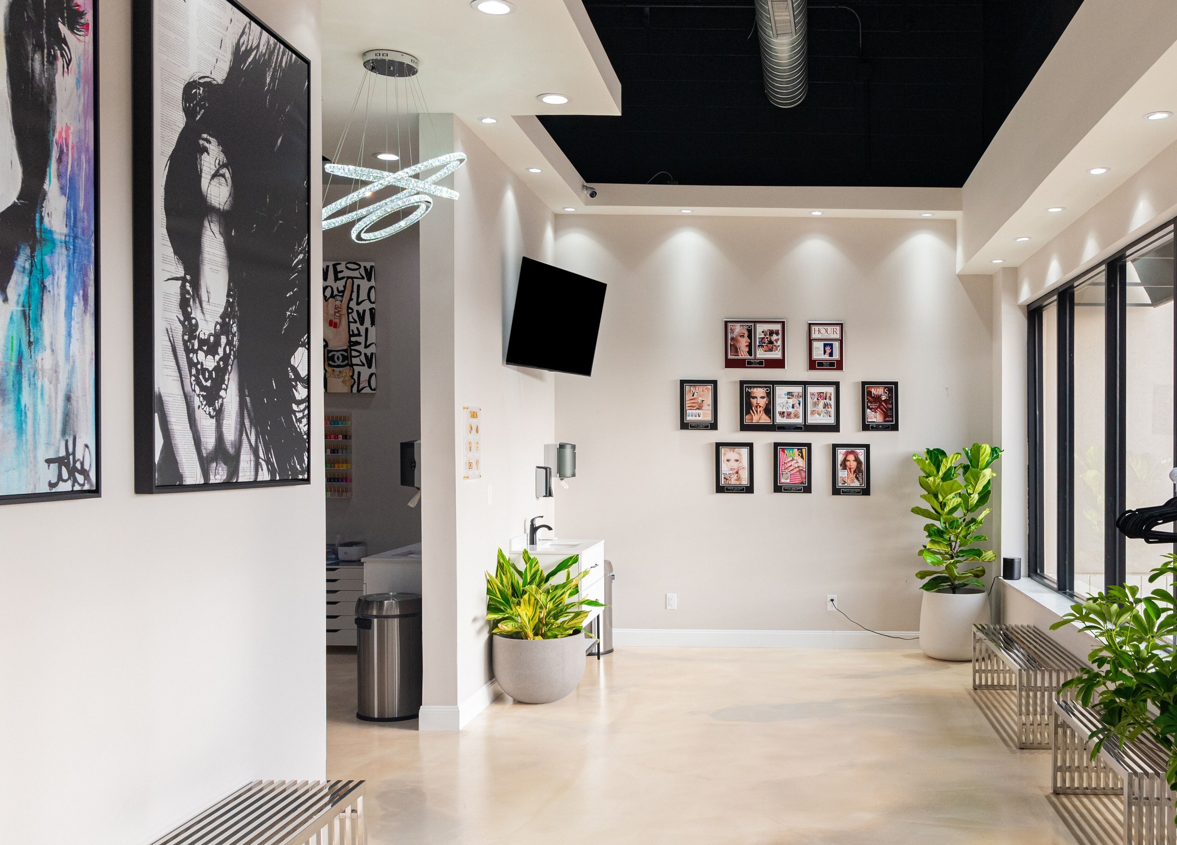 Gloss Nail Atelier lobby with chic decor and art in Sterling Heights, Michigan, US.