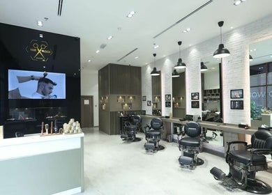 Interior of Hair Fusion Gents Saloon Wadi Al Safa 3 Branch in دبي, دبي, AE showcasing modern barber chairs.