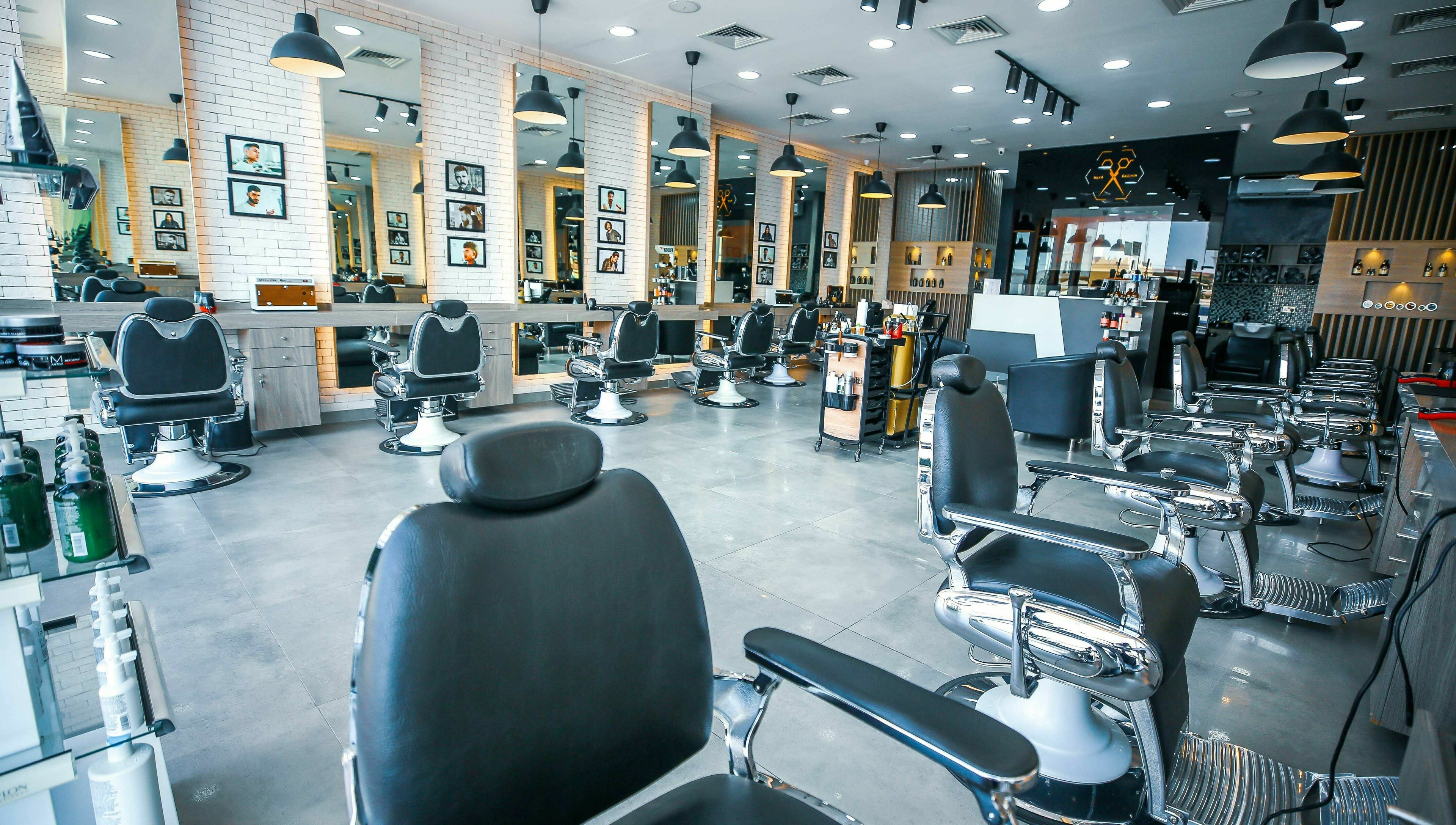 Modern interior of Ward Salon in Dubai, Dubai, AE, featuring stylish barber chairs and elegant design.