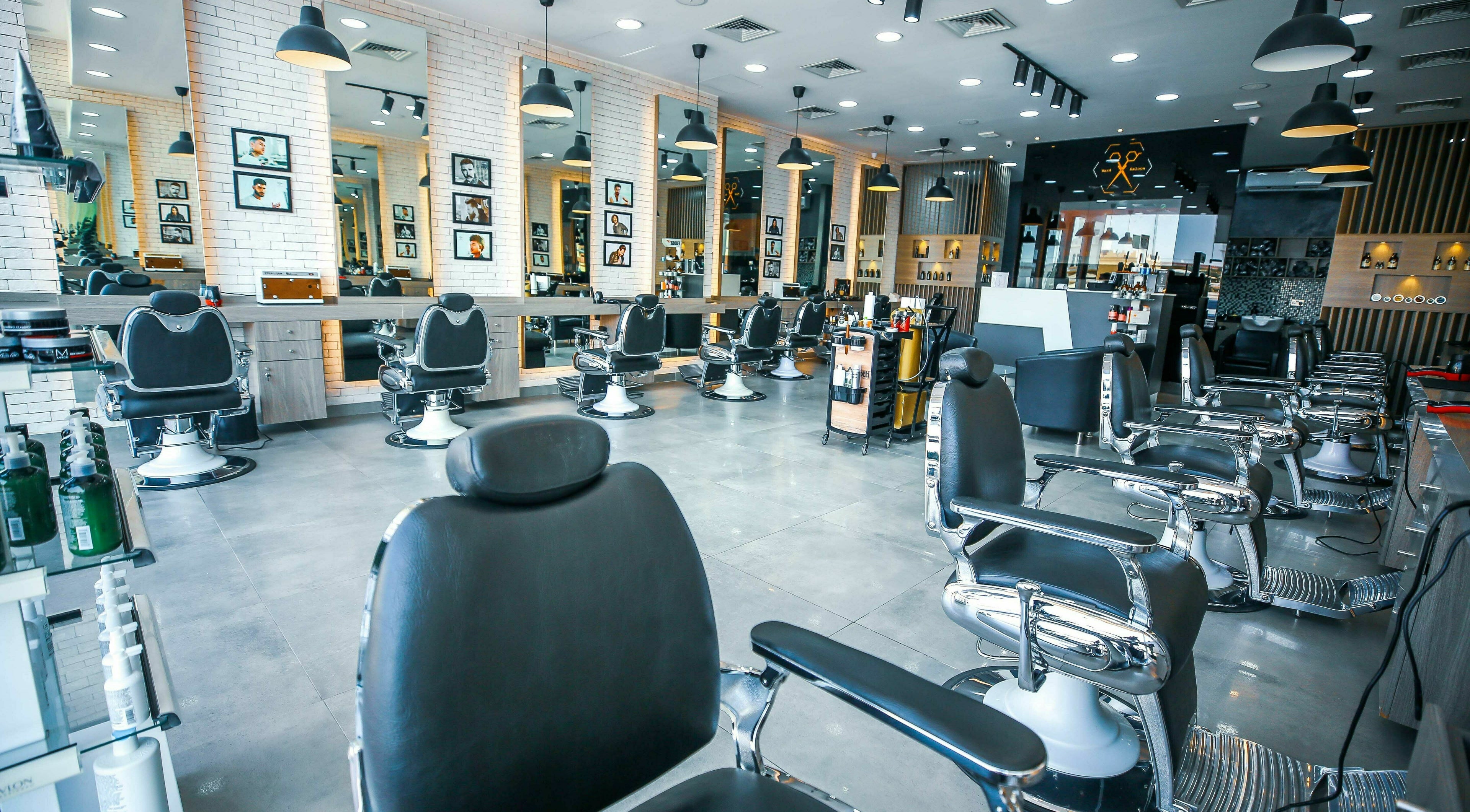 Modern interior of Ward Salon in Dubai, Dubai, AE, featuring stylish barber chairs and elegant design.