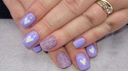 Lavender nail art with hearts from Beauty By Jo in Guiseley, England, GB—charming and stylish design.