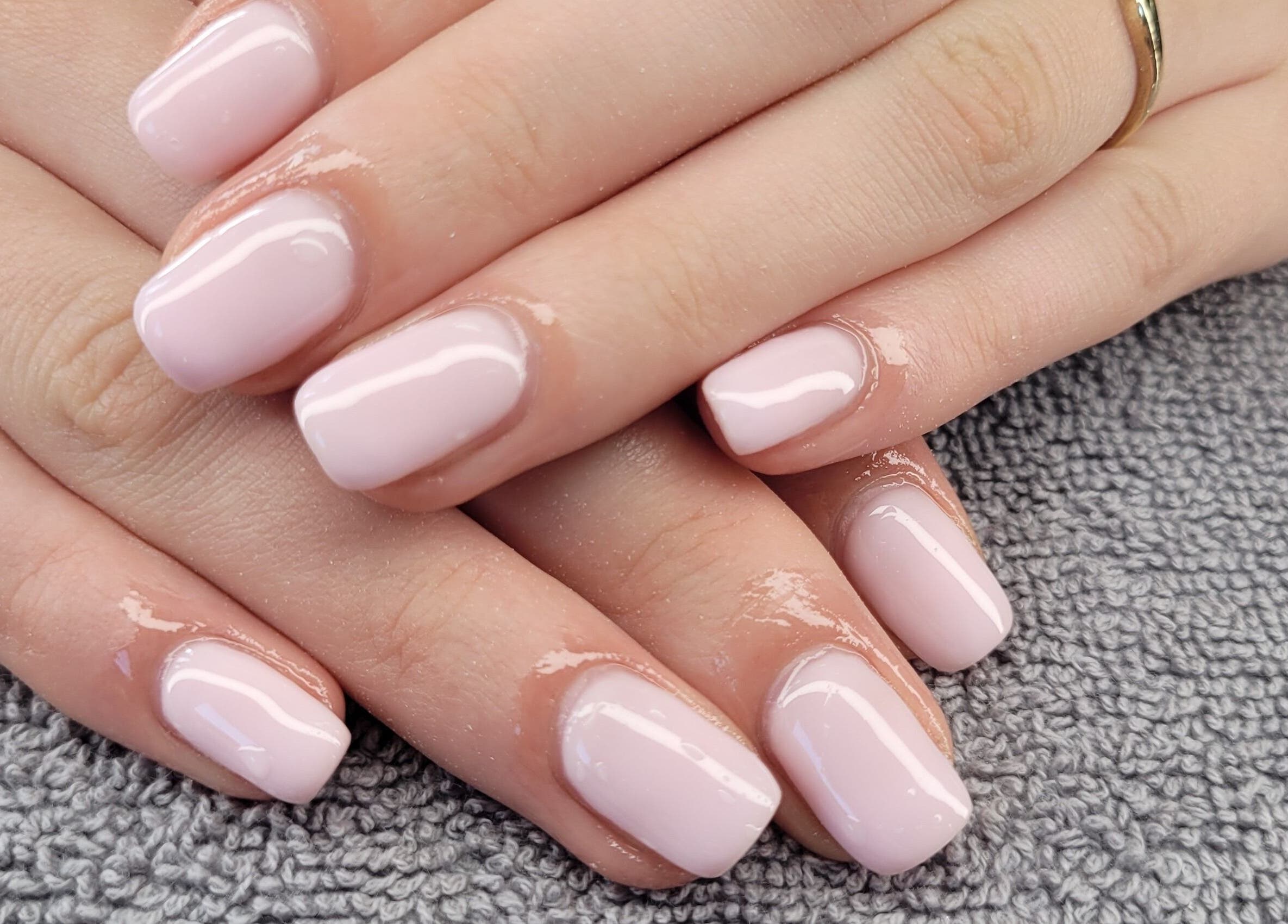 Freshly manicured pink nails at Beauty By Jo, Guiseley, England, GB, showcasing expert nail art services.