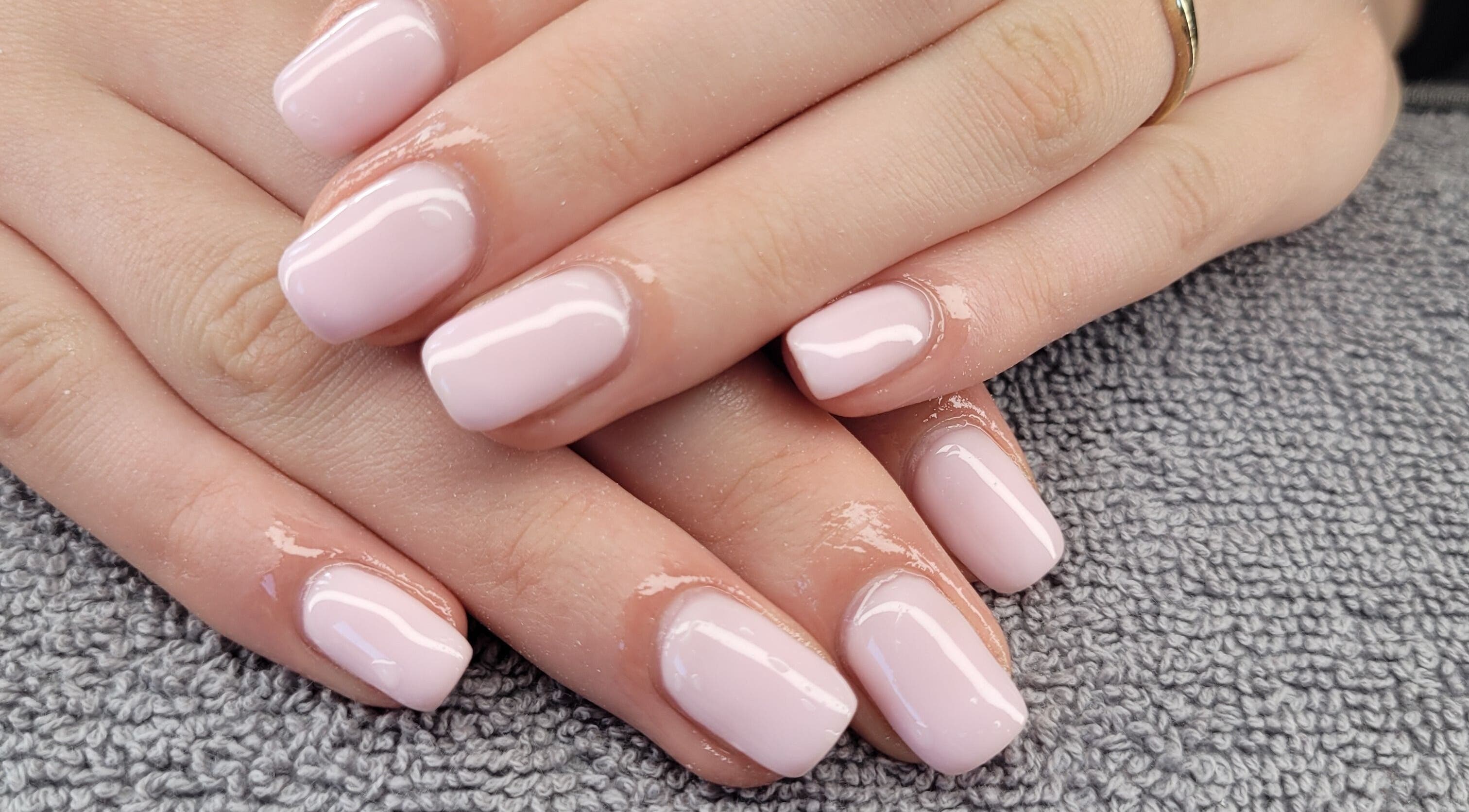 Freshly manicured pink nails at Beauty By Jo, Guiseley, England, GB, showcasing expert nail art services.