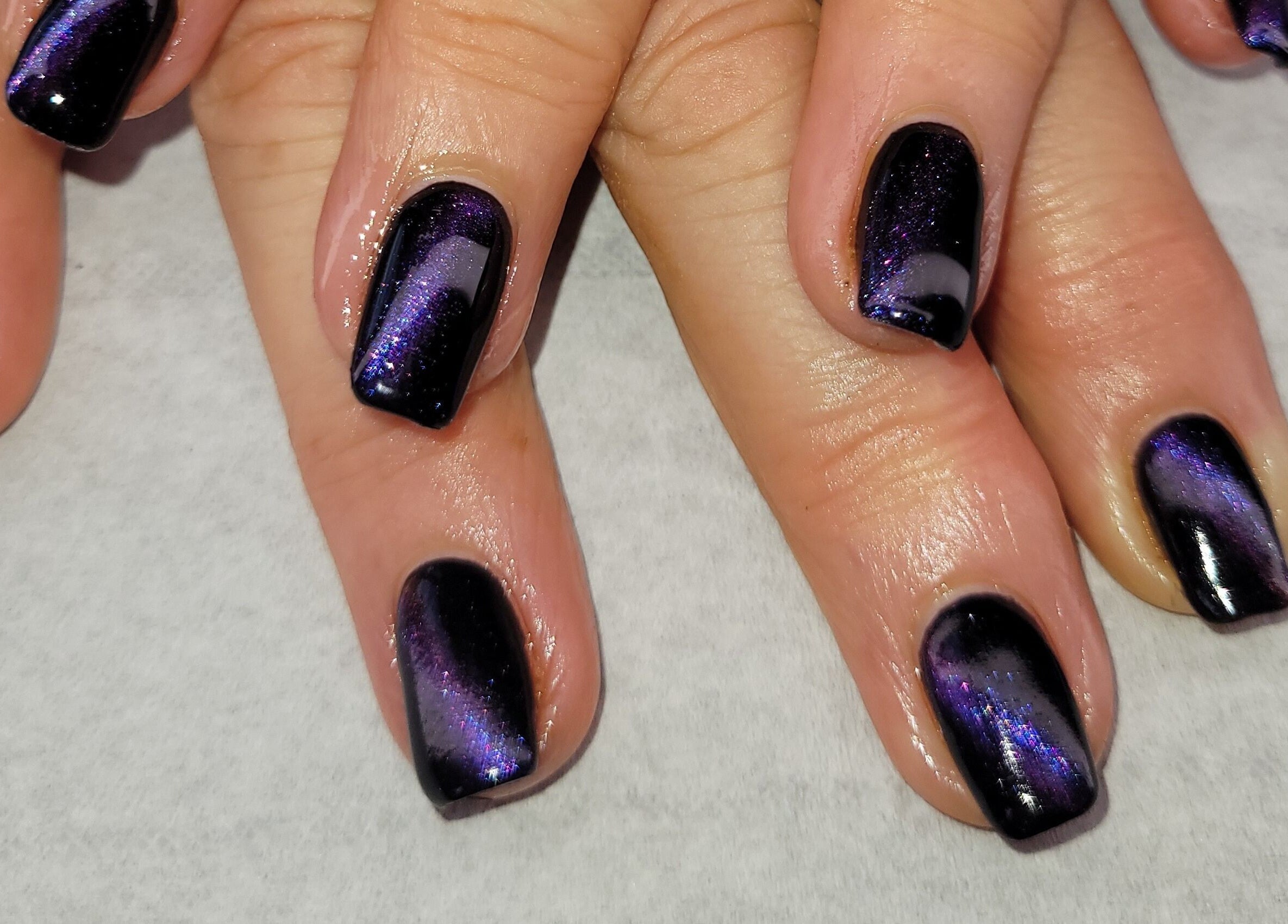 Shimmering galaxy nail art at Beauty By Jo, Guiseley, England, GB offering unique beauty services.