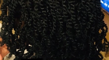 Elegant curly hairstyle showcased at Lewa Hair, Newmarket, England, GB enhancing natural beauty.