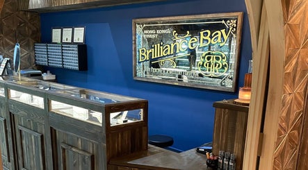 Elegant counter at Brilliance Bay Piercing Boutique, Central, Hong Kong Island, HK, showcasing jewelry display.