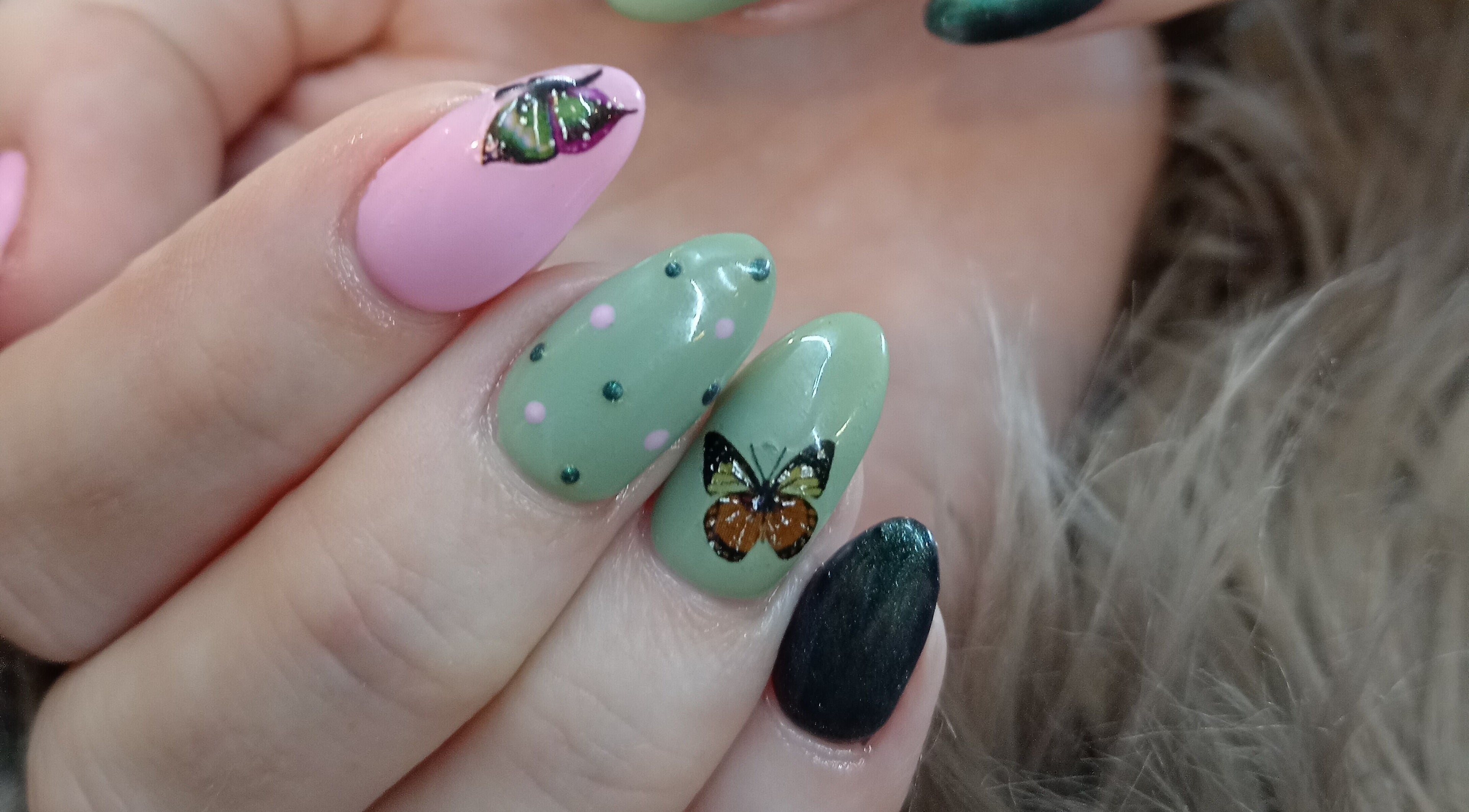 Elegant nail art with butterfly design at Tippity Toes Nails and Beauty, Krugersdorp, Gauteng, ZA.