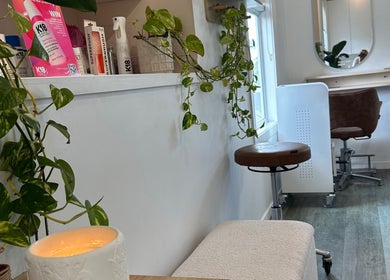 Cozy hair styling corner with plants at AoifeMariehairartistry, Brisbane, Queensland, AU.