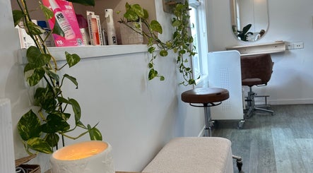 Cozy hair styling corner with plants at AoifeMariehairartistry, Brisbane, Queensland, AU.