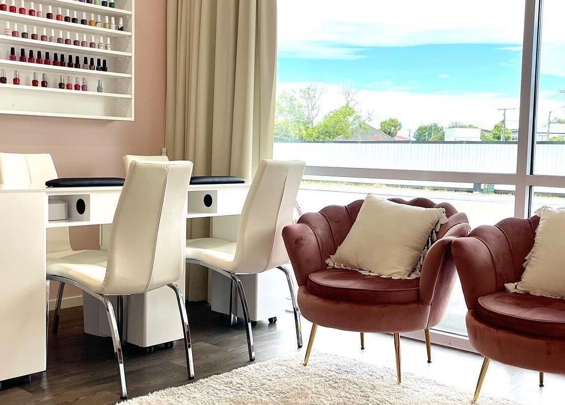 Manicure station with plush seating at Glowing Goddess Beauty, Christchurch, Canterbury, NZ.