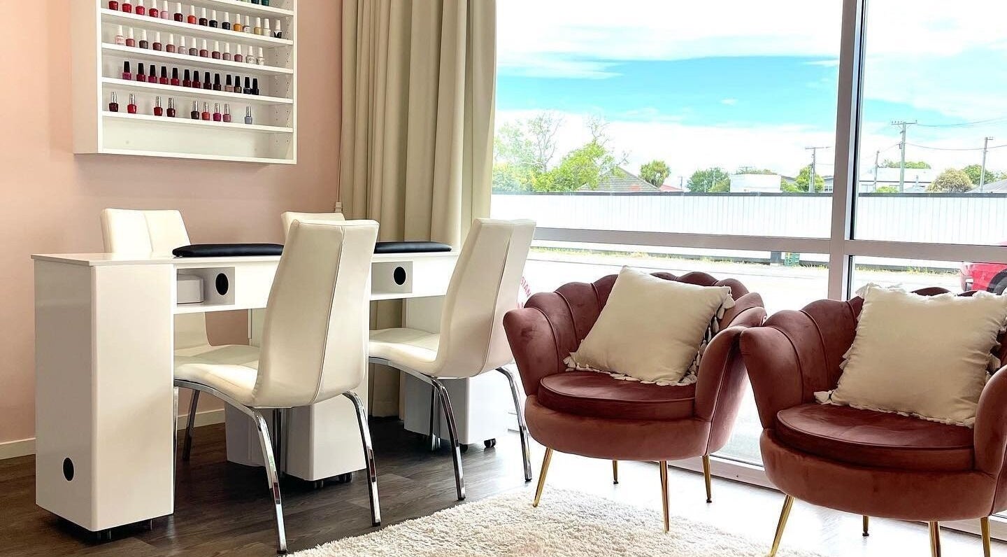 Manicure station with plush seating at Glowing Goddess Beauty, Christchurch, Canterbury, NZ.