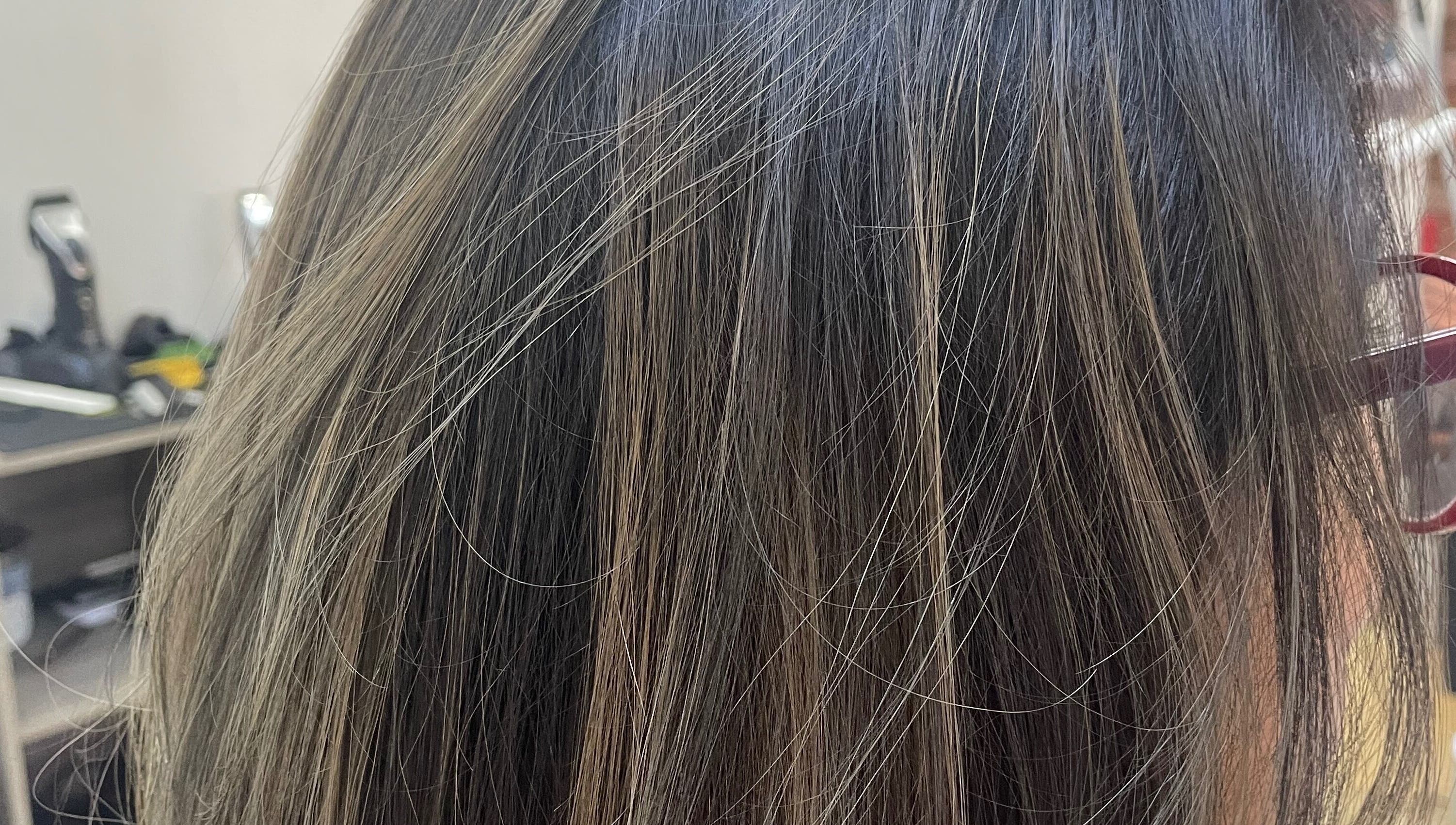 Close-up of highlighted hair at Waz Hair Care, Grand Port, MU.