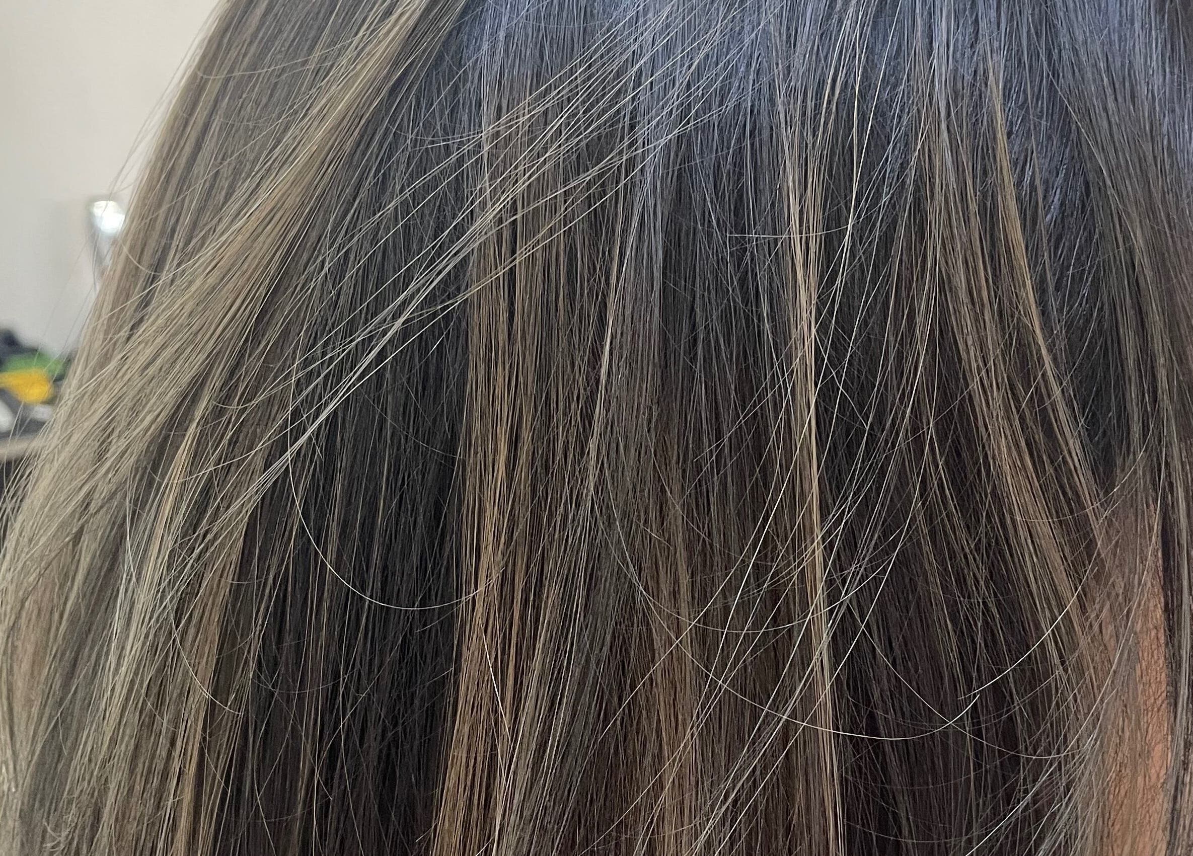 Close-up of highlighted hair at Waz Hair Care, Grand Port, MU.