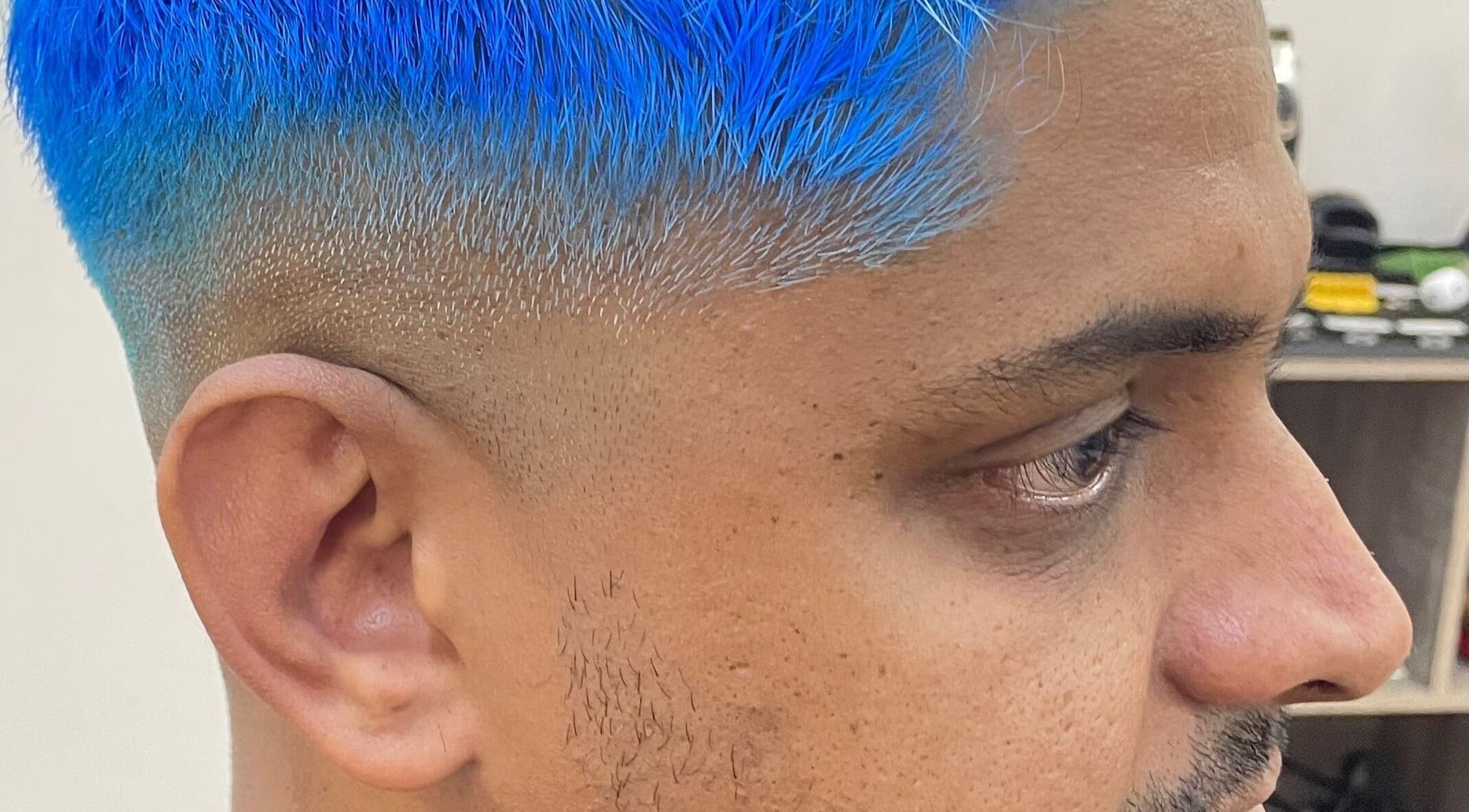 Close-up of a vibrant blue hair dye at Waz Hair Care, Grand Port, MU.