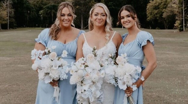 Bridal party at Labelleame Aesthetics, Corindi Beach, New South Wales, AU, showcasing elegant floral bouquets.
