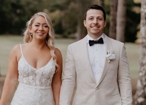 Wedding couple at Labelleame Aesthetics, Corindi Beach, New South Wales, AU, enjoy a picturesque forest setting.