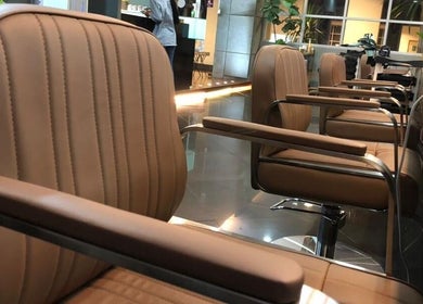 Luxurious salon chairs at Hairkunst Premium Salon, Petaling Jaya, Selangor, MY for ultimate comfort and style.
