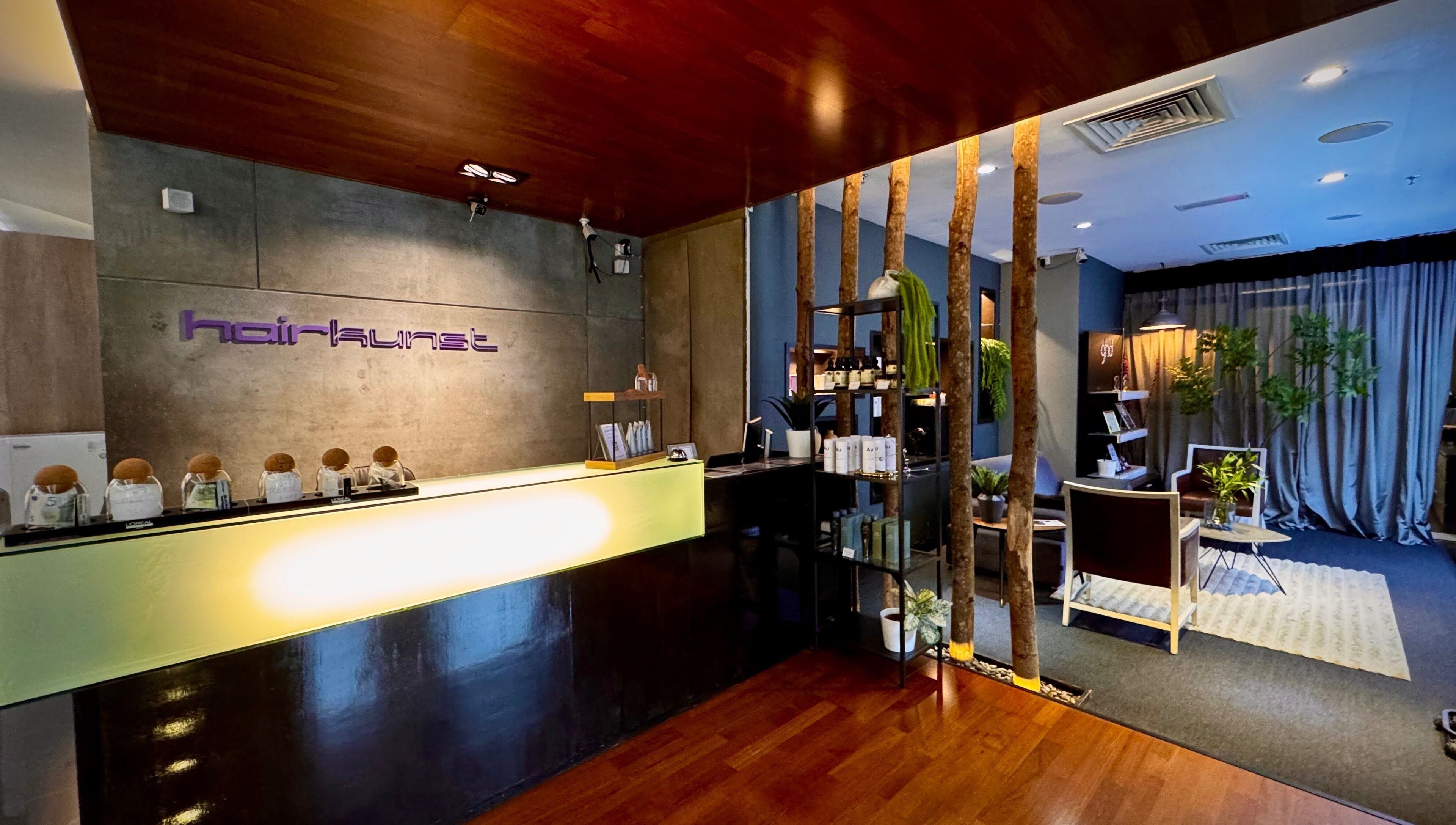 Modern interior of Hairkunst Premium Salon in Petaling Jaya, Selangor, MY with stylish decor and reception.