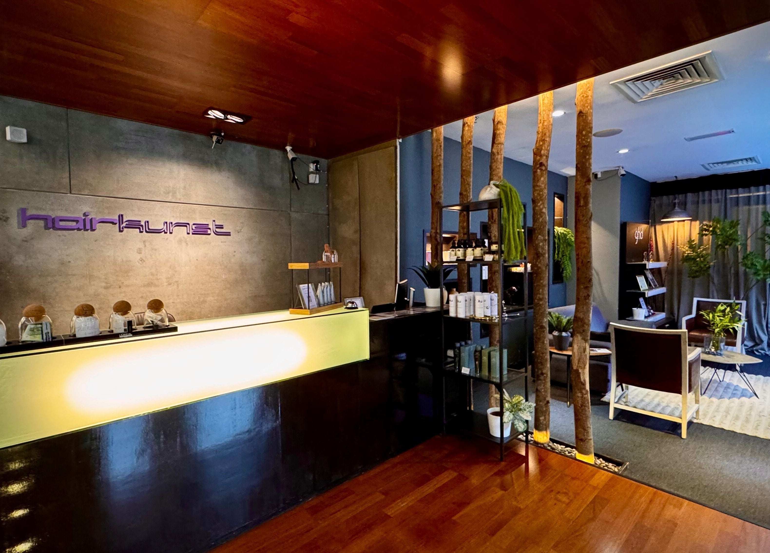 Modern interior of Hairkunst Premium Salon in Petaling Jaya, Selangor, MY with stylish decor and reception.