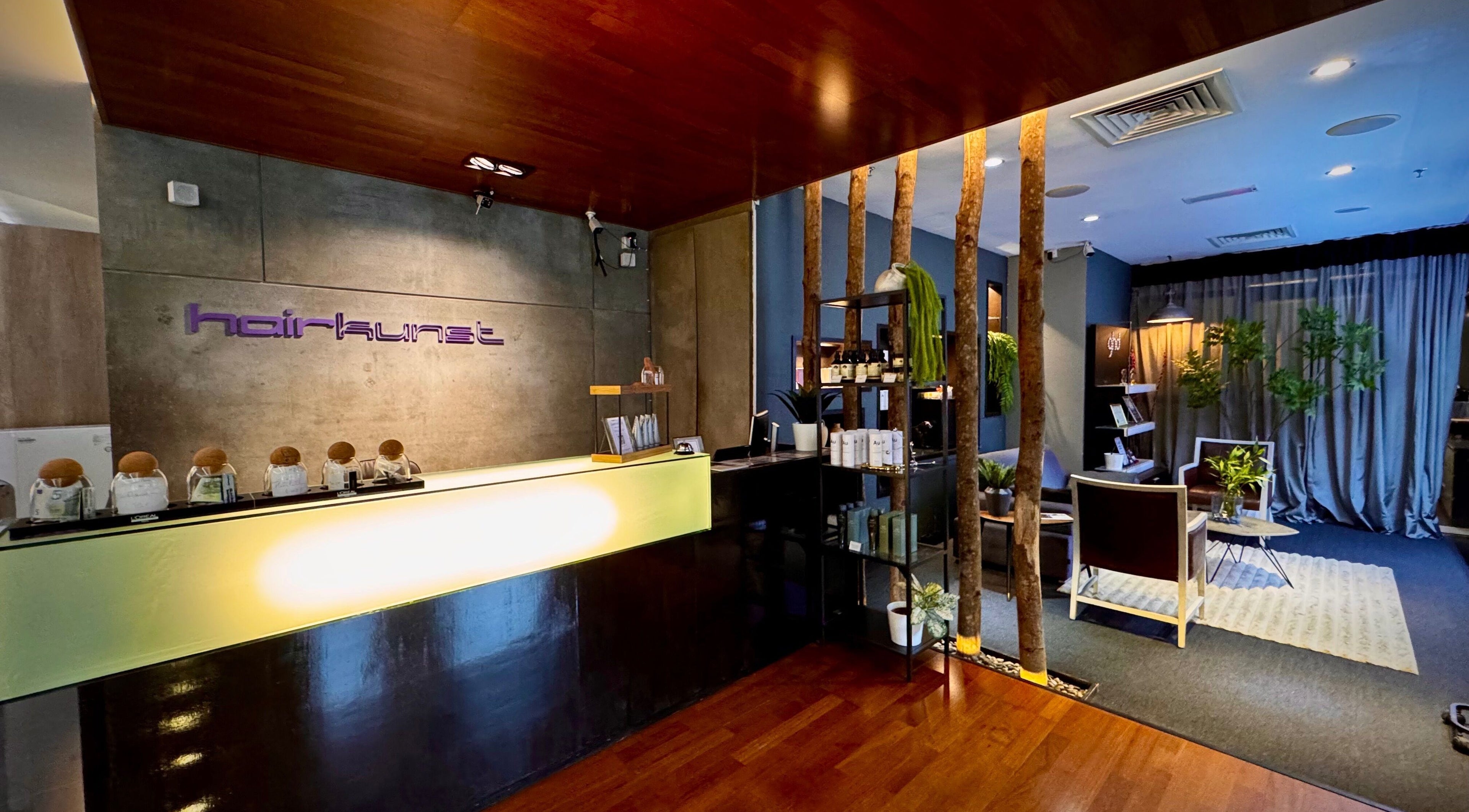 Modern interior of Hairkunst Premium Salon in Petaling Jaya, Selangor, MY with stylish decor and reception.