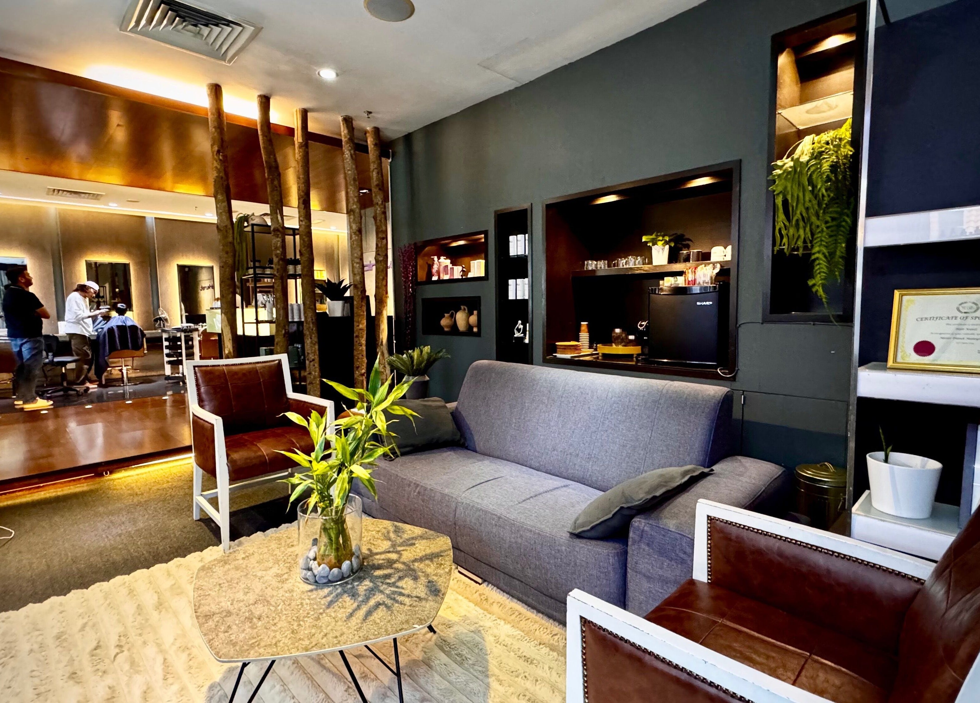 Elegant lounge area at Hairkunst Premium Salon in Petaling Jaya, Selangor, MY with cozy seating and decor.