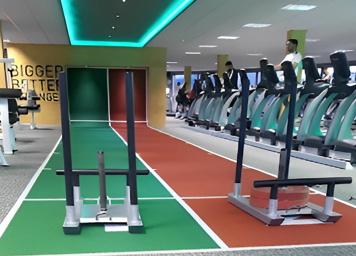 Modern gym equipment at Direct Gainz, Birmingham, England, GB, highlighting fitness spaces and workout zones.