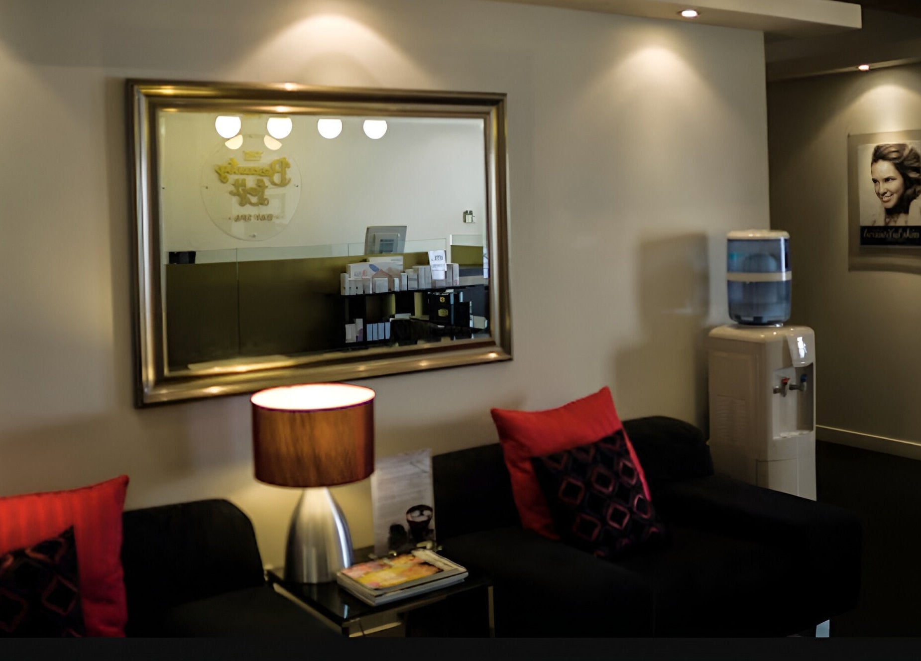 Cozy seating area at The Beauty Loft Day Spa, Auckland, Auckland, NZ, featuring plush chairs and ambient lighting.