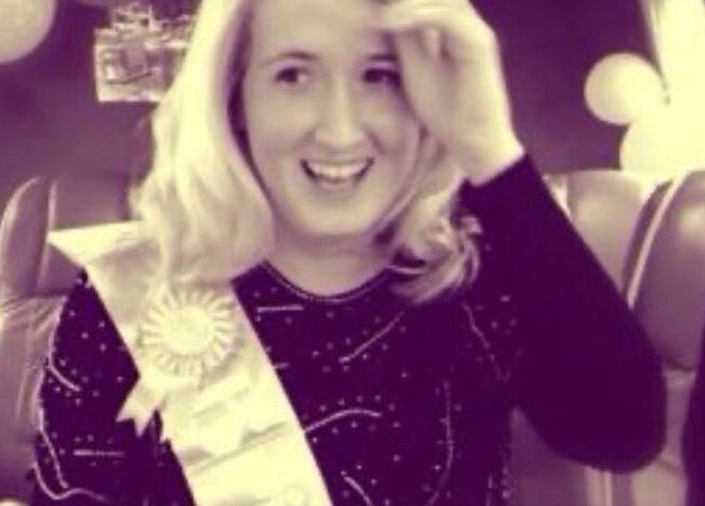 Smiling person wearing a sash at Joanne Henderson Bridal Hair, County Kerry, County Kerry, IE.