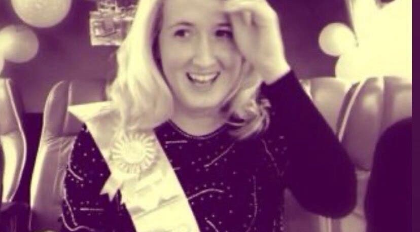 Smiling person wearing a sash at Joanne Henderson Bridal Hair, County Kerry, County Kerry, IE.