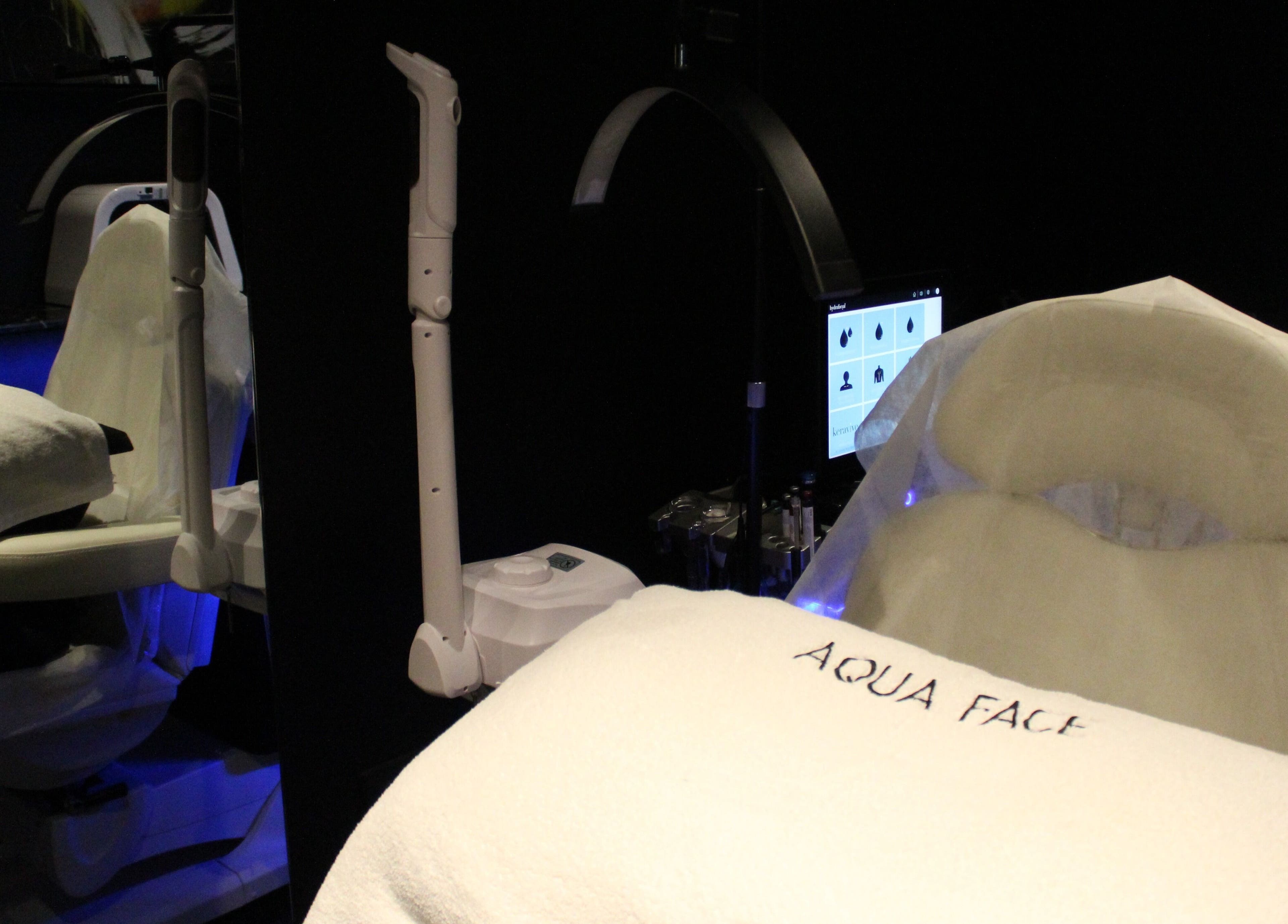 Luxury spa setup at Aqua Face Facial Bar in Dubai, Dubai, AE with modern facial treatment equipment.