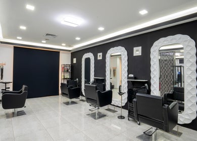 Sleek styling chairs and mirrors at Beauty Lounge, Salmiya, Hawalli Governorate, KW.