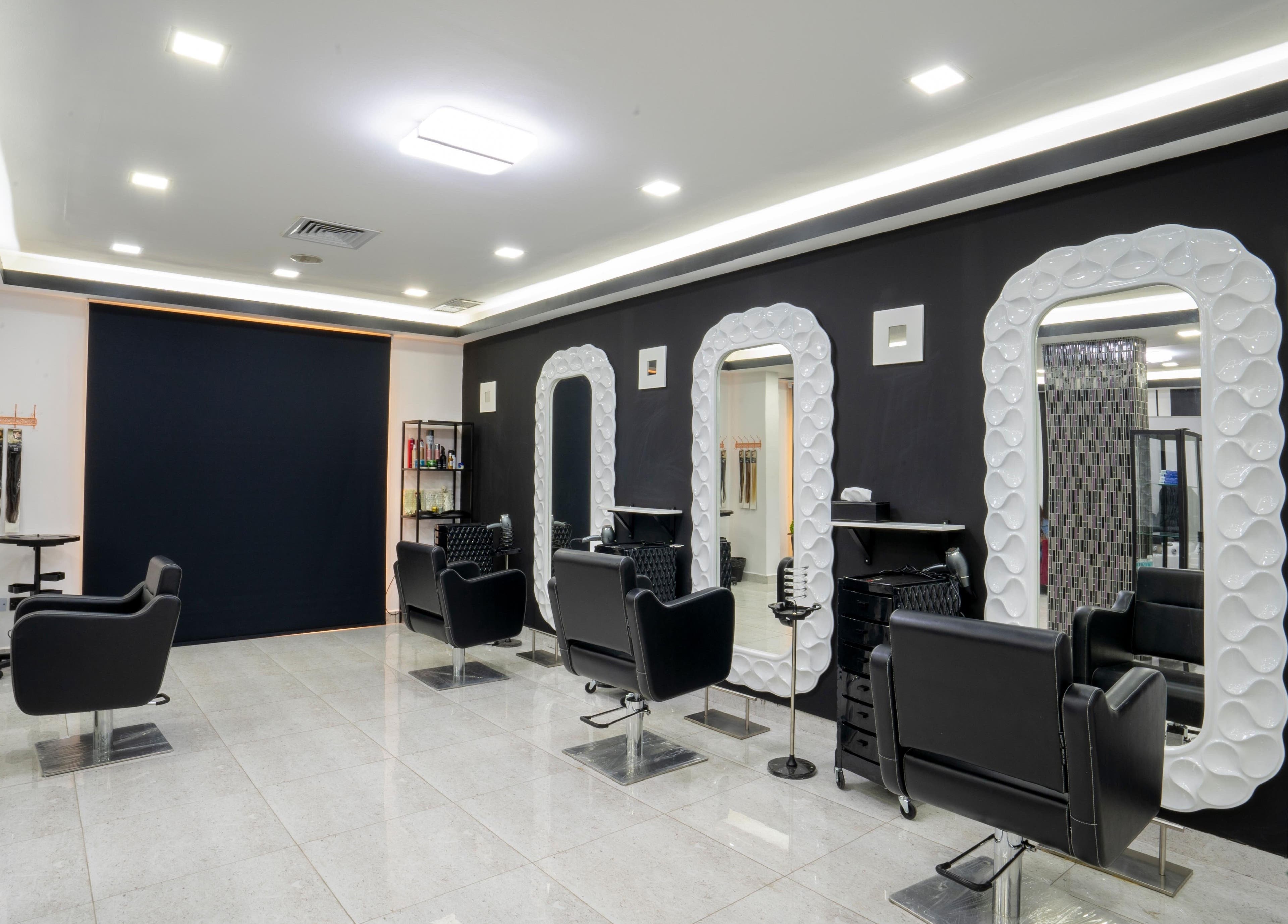 Sleek styling chairs and mirrors at Beauty Lounge, Salmiya, Hawalli Governorate, KW.