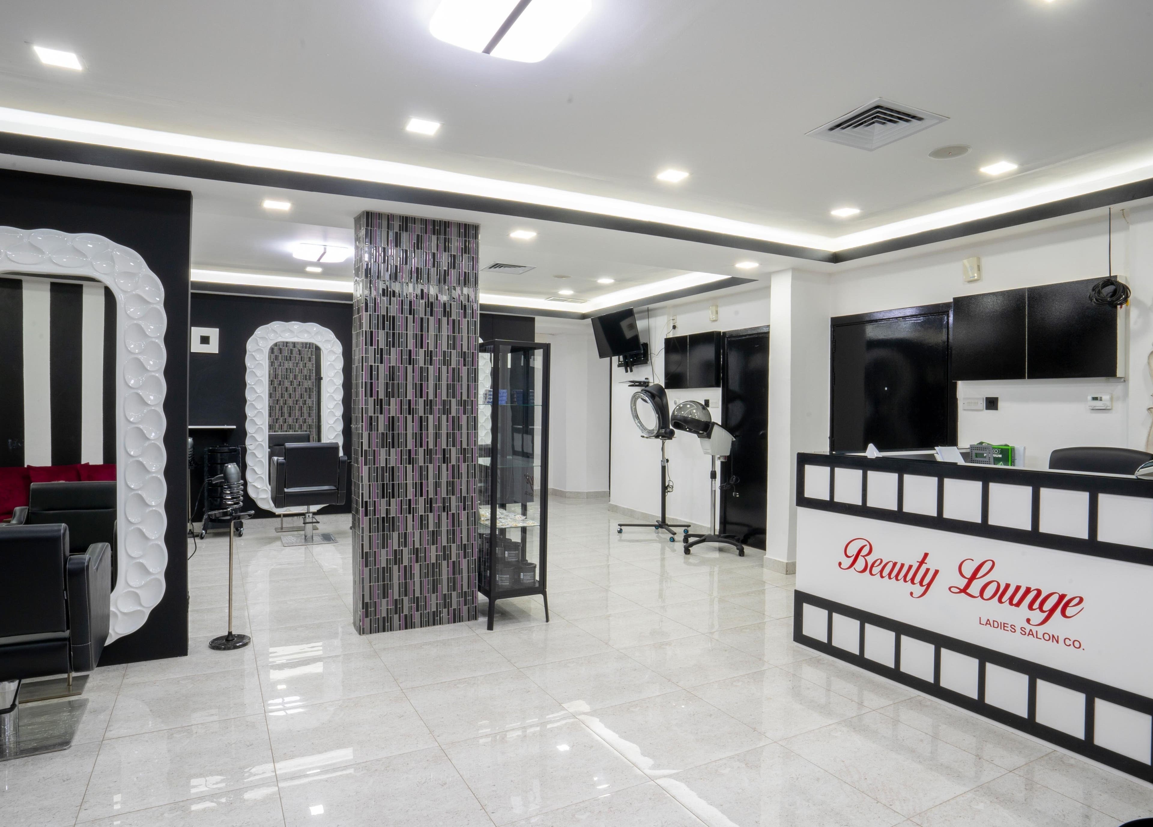 Modern interior of Beauty Lounge in Salmiya, Hawalli Governorate, KW, showcasing sleek salon chairs and decor.