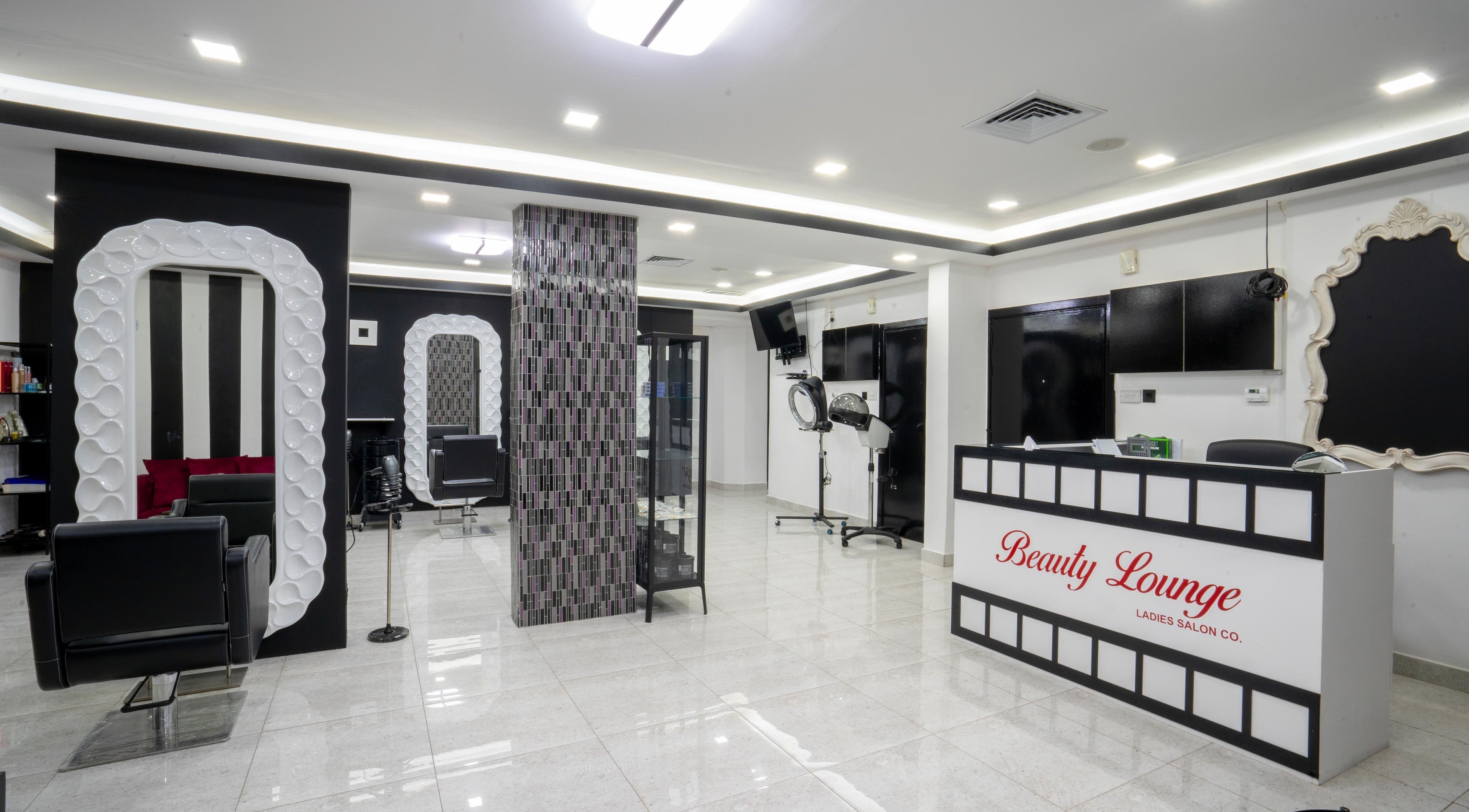 Modern interior of Beauty Lounge in Salmiya, Hawalli Governorate, KW, showcasing sleek salon chairs and decor.