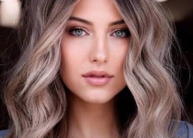 Woman with elegant wavy hair at Hair Muse, Pretoria, Gauteng, ZA.