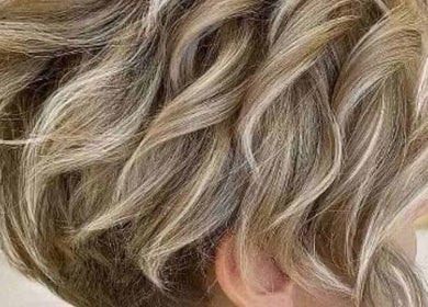 Blonde wavy hairstyle at Hair Muse in Pretoria, Gauteng, ZA. Perfect salon finish.