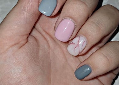 Elegant manicure with pastel colors at Royal Beauty, Bloemfontein, Free State, ZA.