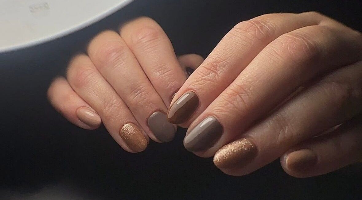 Stylish brown and gold manicure at House of Nostalgia- Salon & Academy, Leicestershire, England, GB.