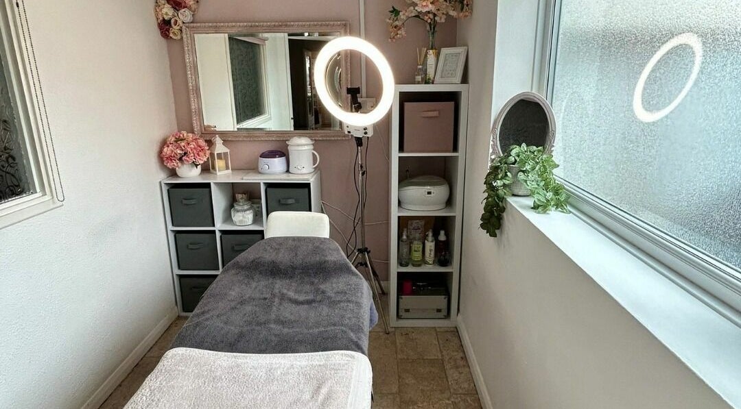 Relaxing treatment room at So Lovely Hair & Beauty Ltd, Bognor Regis, England, GB with calming decor.