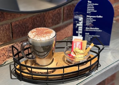 Hot chocolate with biscuits at Warren Anthony Hair Salon, Gosport, England, GB creates a relaxing experience.