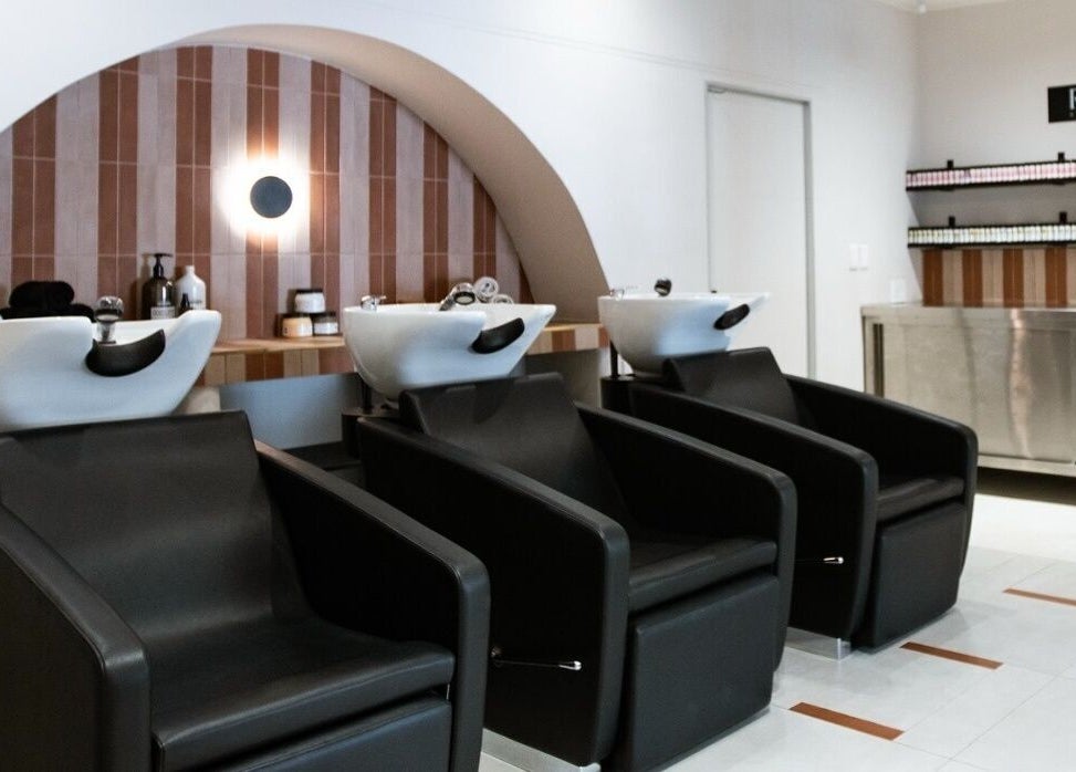 Elegant hair wash stations at STATIC Dry Bar in Durban North, Kwazulu-natal, ZA, offering luxury services.