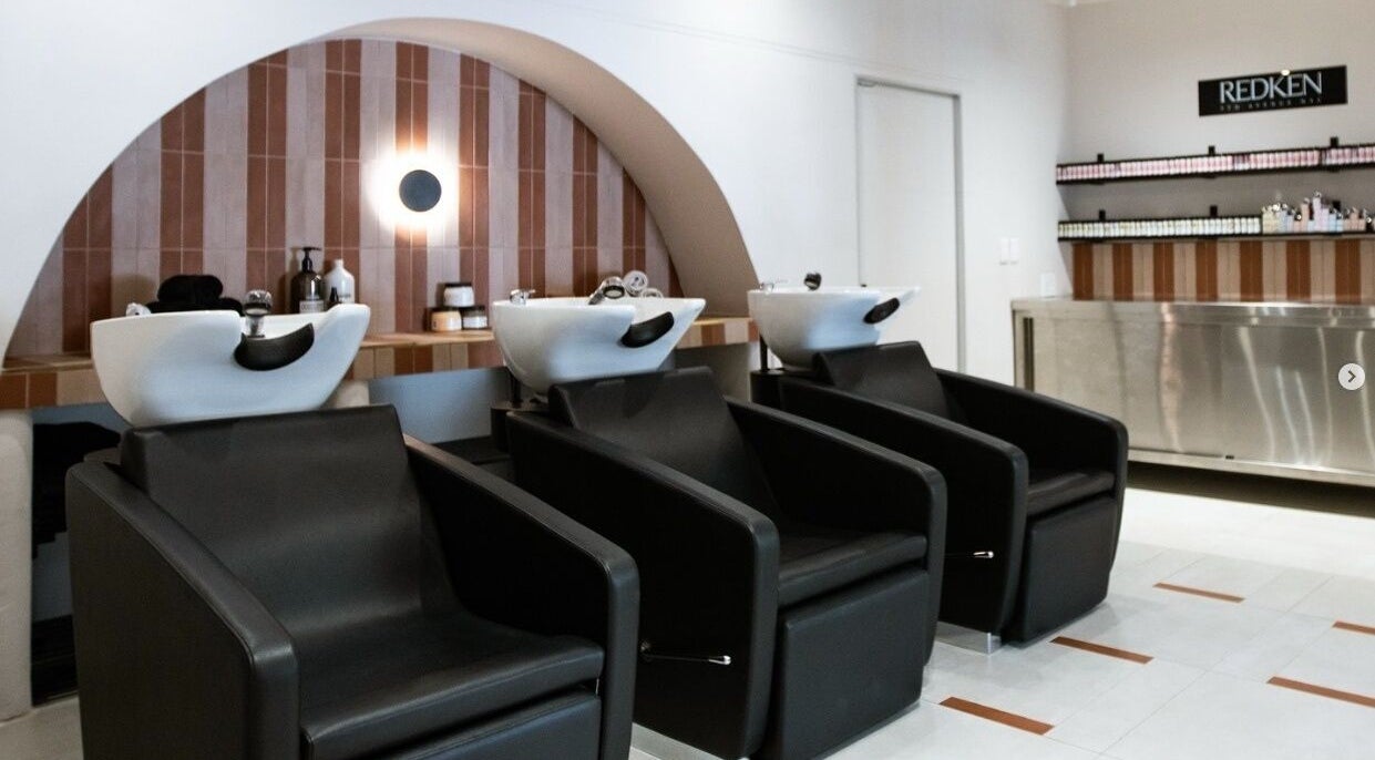 Elegant hair wash stations at STATIC Dry Bar in Durban North, Kwazulu-natal, ZA, offering luxury services.