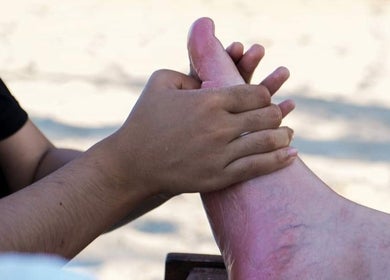 A relaxing foot massage at Impiana Kuantan, Kuantan, Pahang, MY offering soothing wellness services.