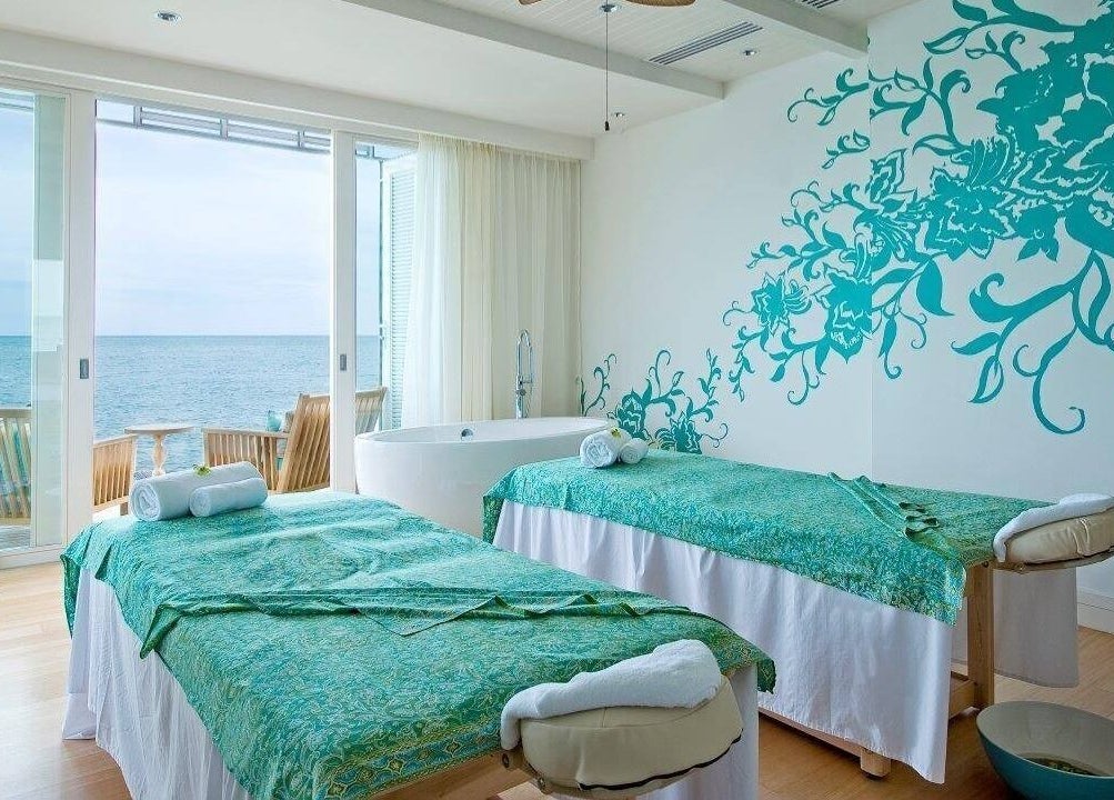 Relaxing massage room at aVi Spa, Port Dickson, Negeri Sembilan, MY overlooking the ocean with calming decor.