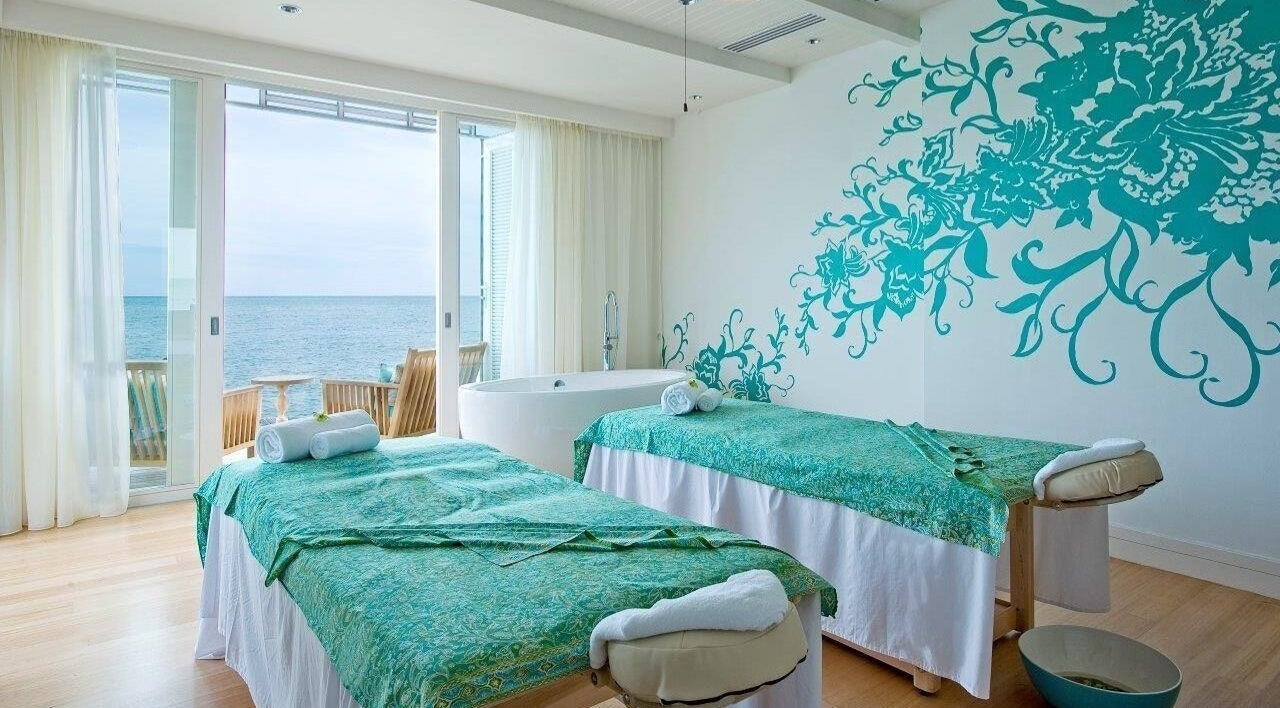 Relaxing massage room at aVi Spa, Port Dickson, Negeri Sembilan, MY overlooking the ocean with calming decor.